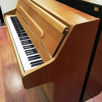 Bentley pre-owned upright piano.