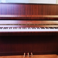 Pertof P115 IIC pre-owned upright piano.