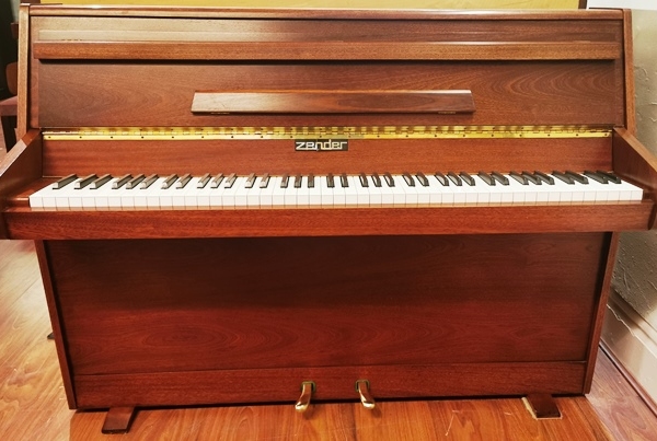 Zender pre-owned upright piano.